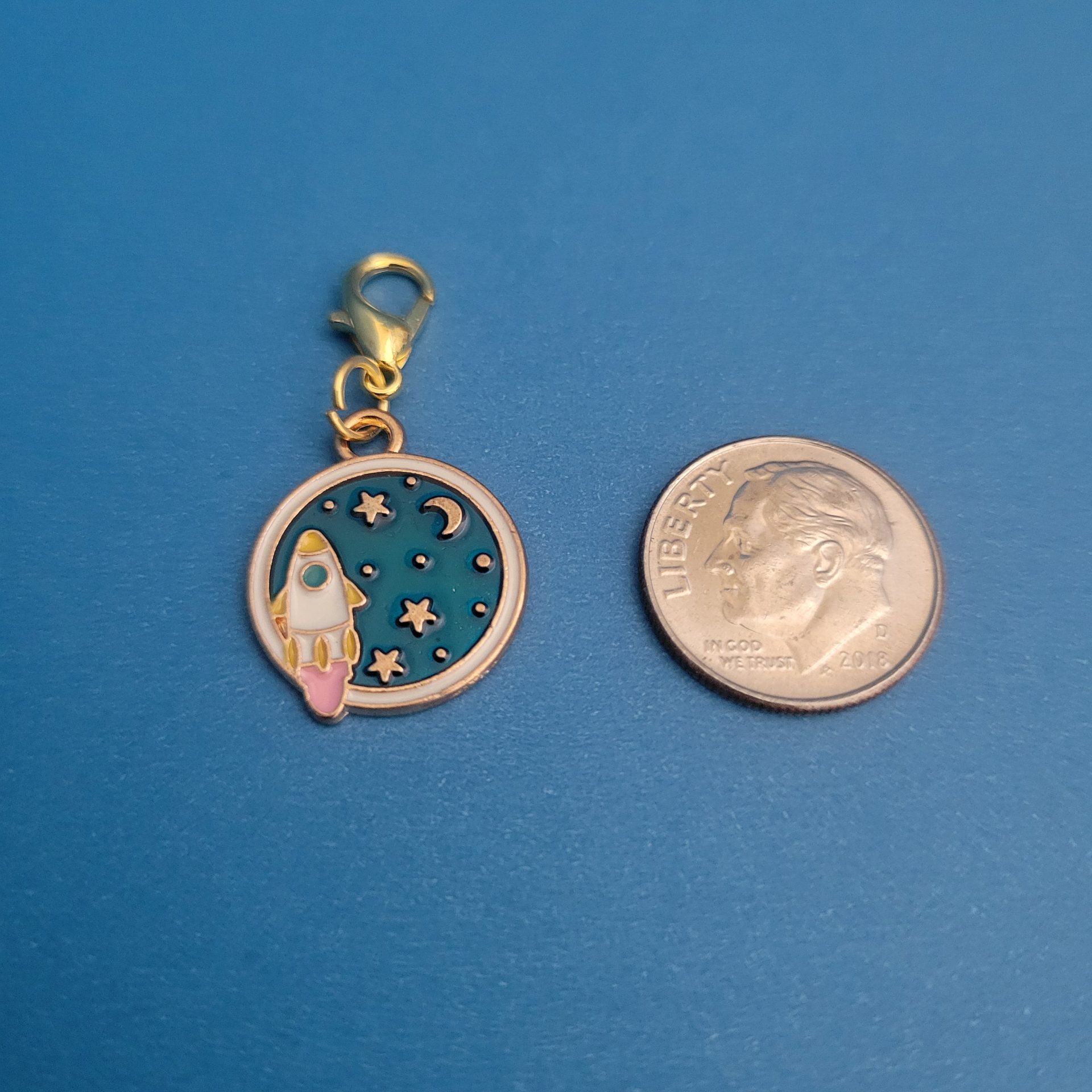 GOLD ENAMELEDSPACE MEDALLION28