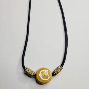 Mustard Yellow Ceramic Disk With Bronze Accents Black Leather Cord