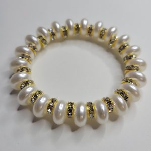 Pearly Whites Pearlescent Donut Beads And Golden Rhinestone Stretch Bracelet
